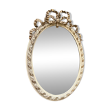 Small old oval gilded mirror
