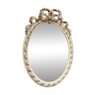 Small old oval gilded mirror