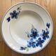 Assiettes creuses dépareillées bleues