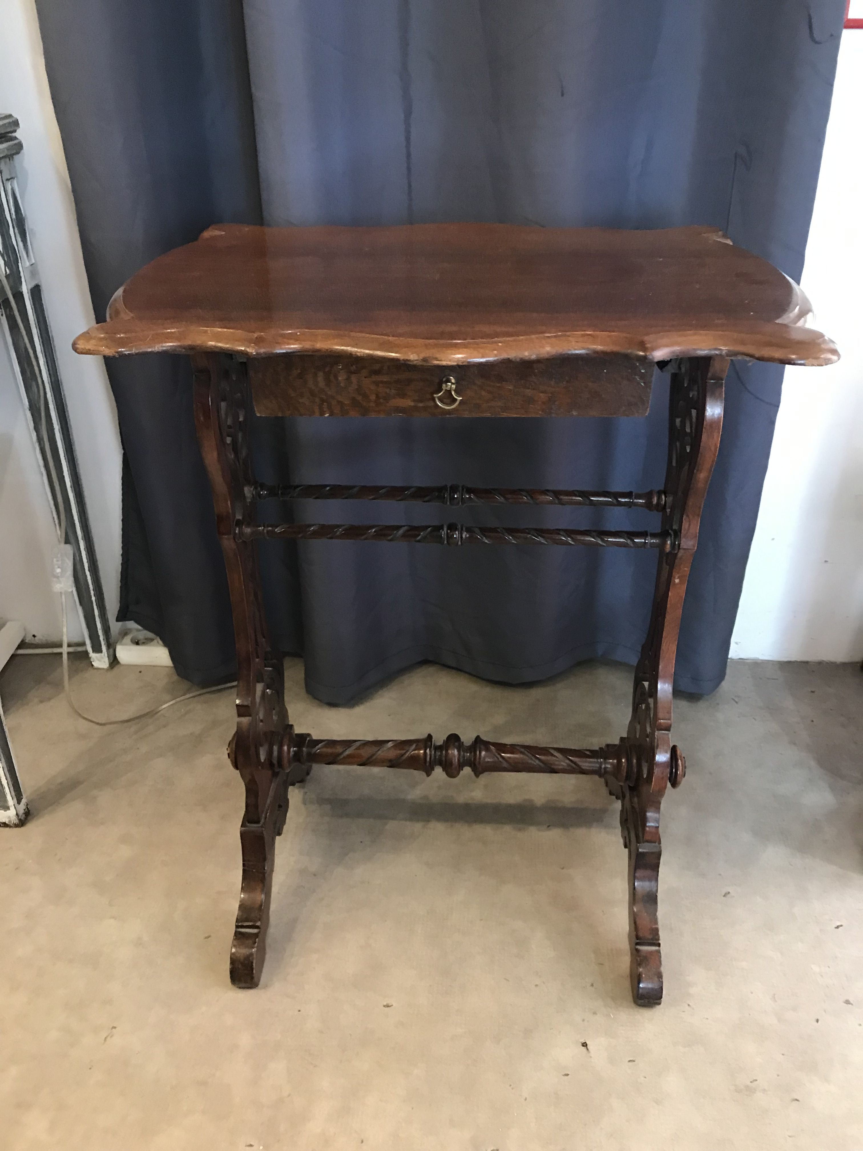 Art nouveau mahogany table with cut-out top