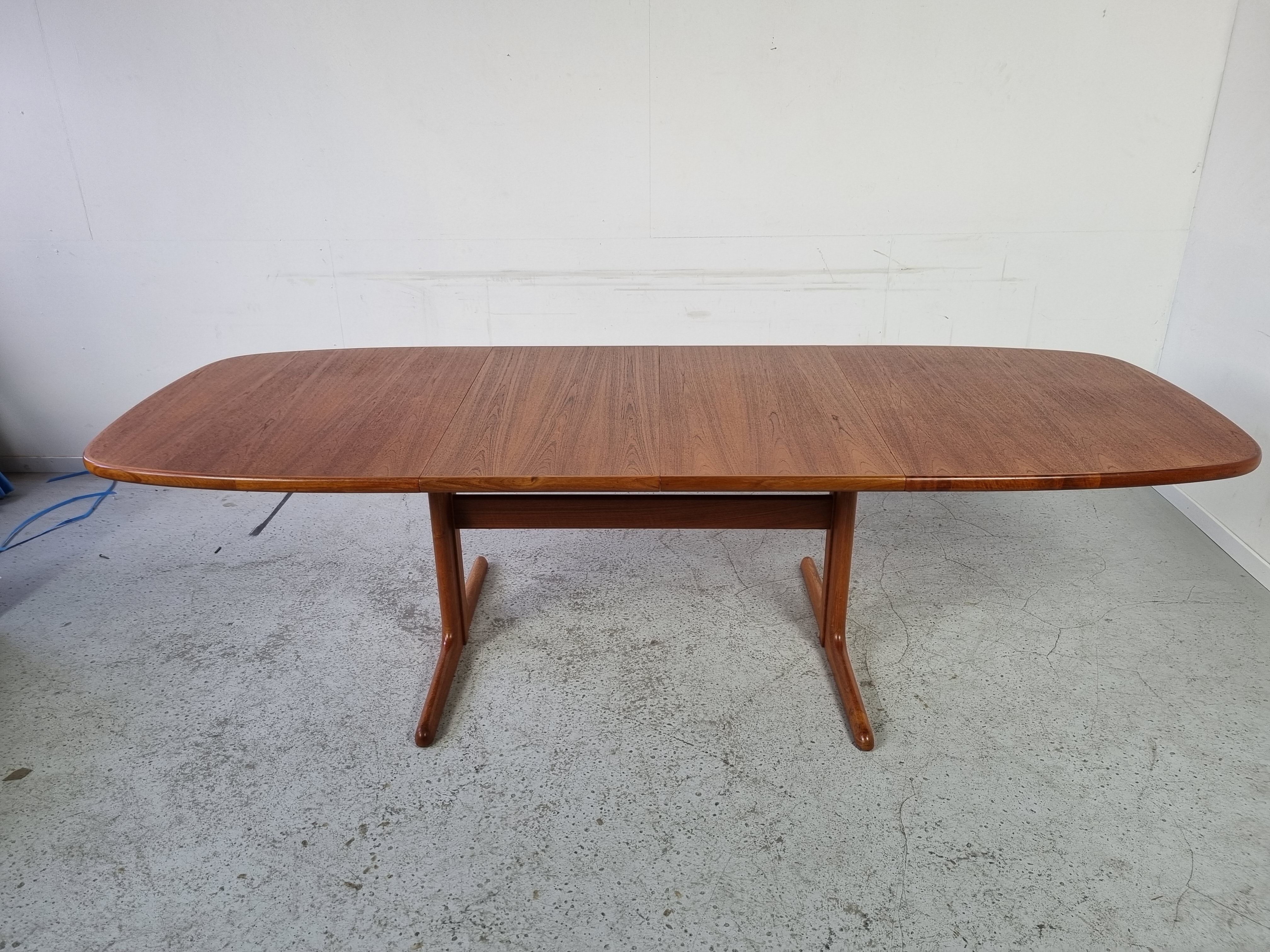 Extendable teak dining table from Dyrlund, Denmark 60s