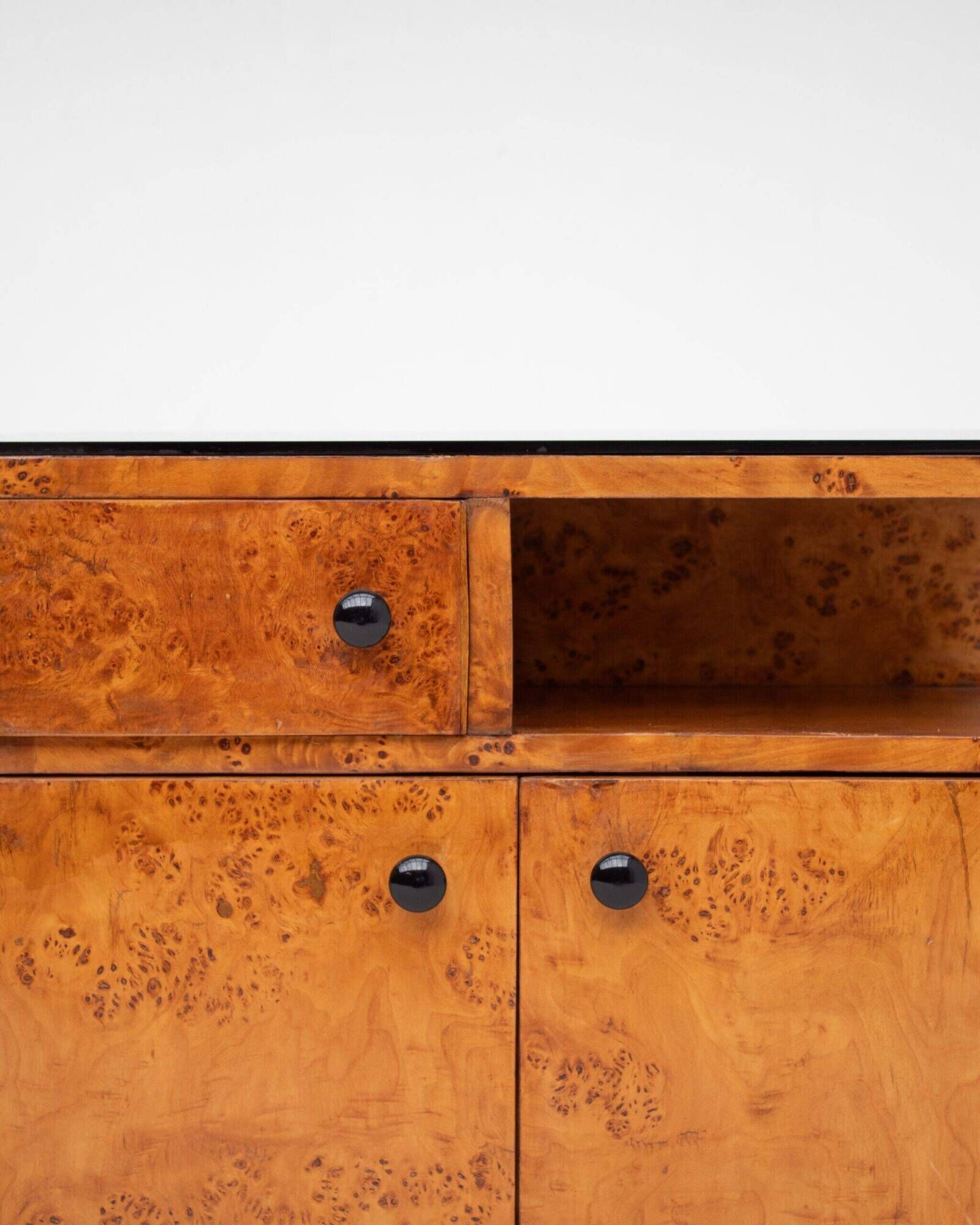 Pair of Art Deco nightstands in burlwood with black lacquered top