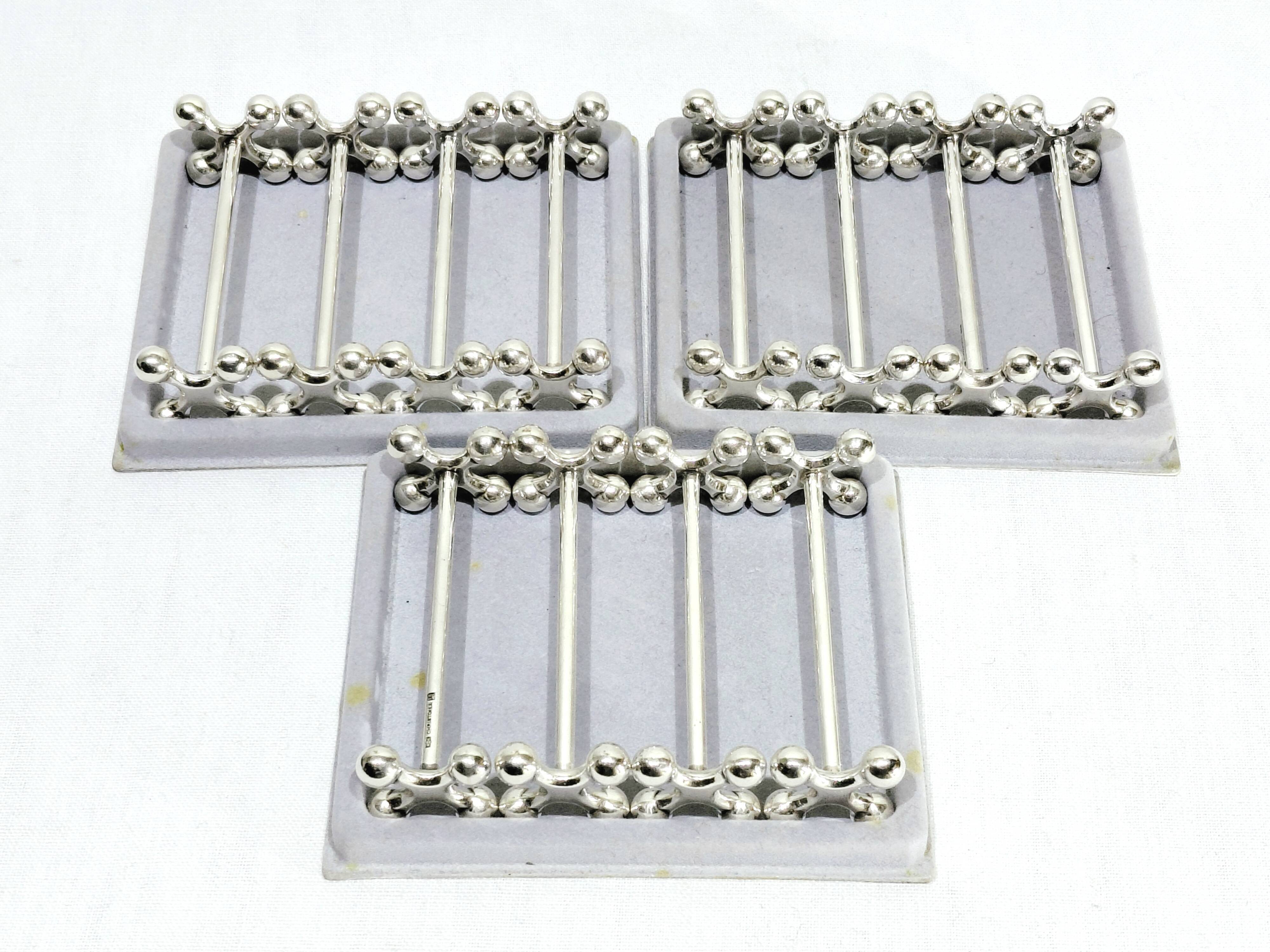 Christofle - 12 ball knife rests