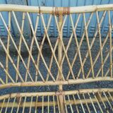 Old wicker rattan armchair