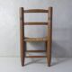 Old wooden straw chair for children