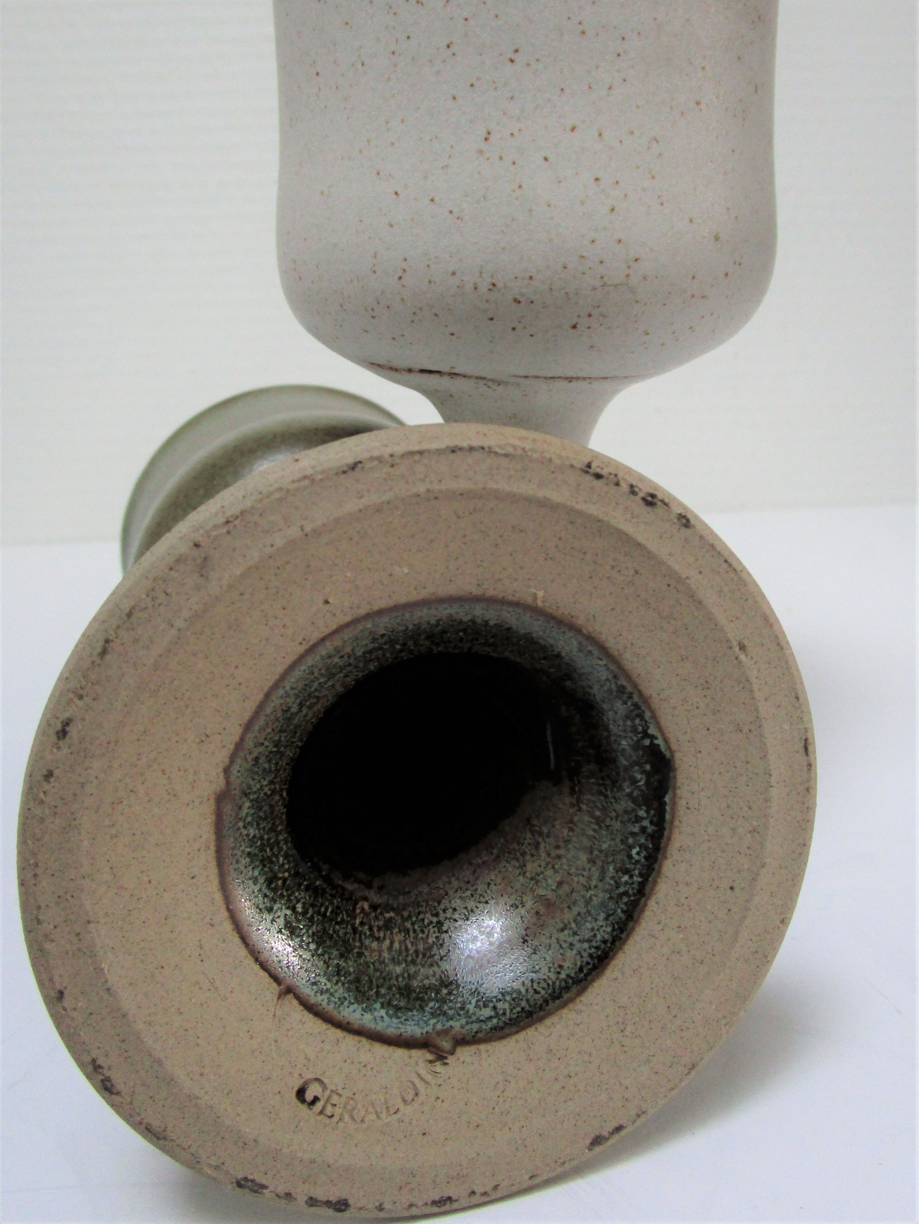 Two enamelled ceramic walking glasses