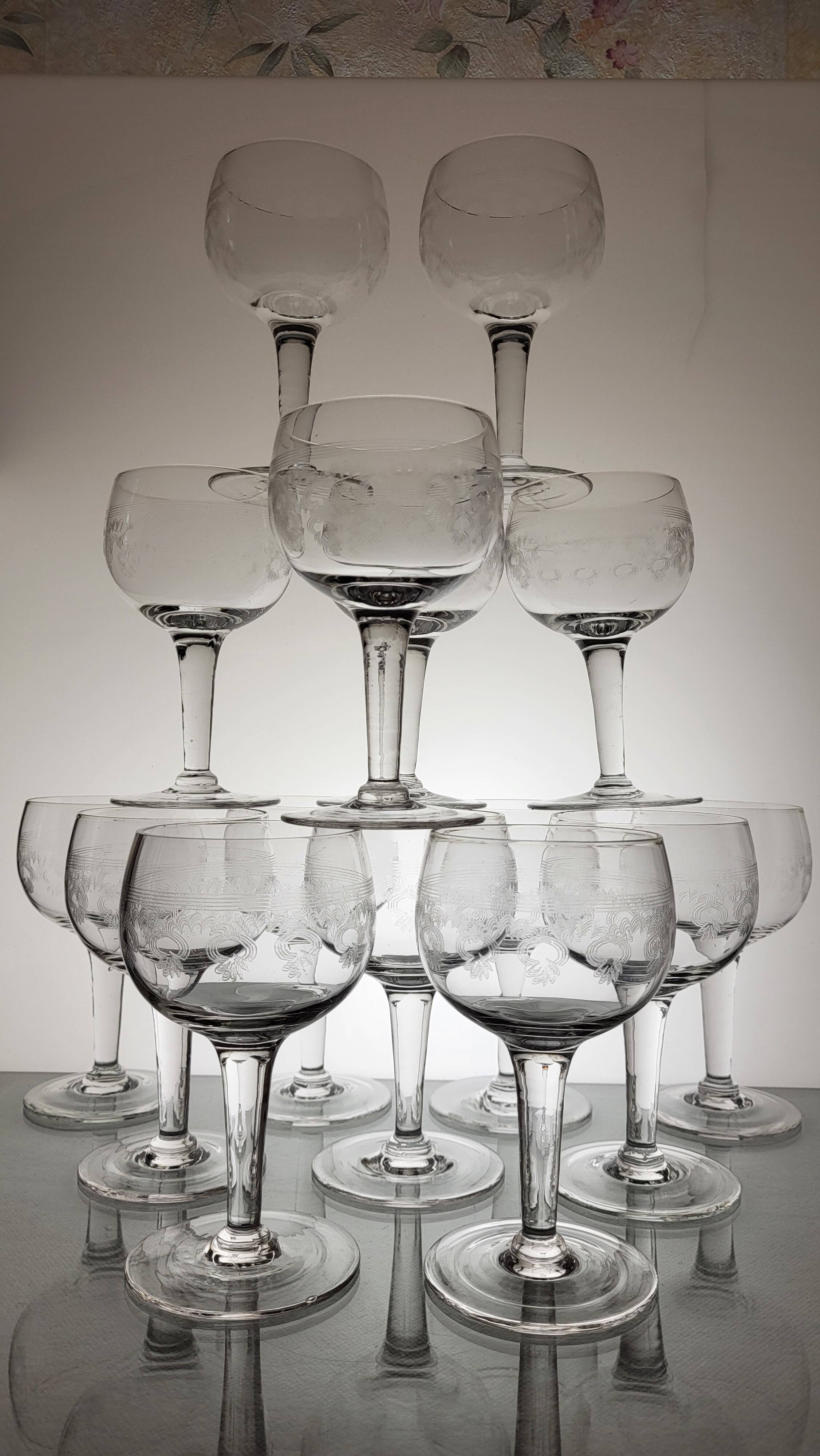 9 guilloche wine glasses, early 20th century