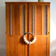 Armoire bois blond et rotin