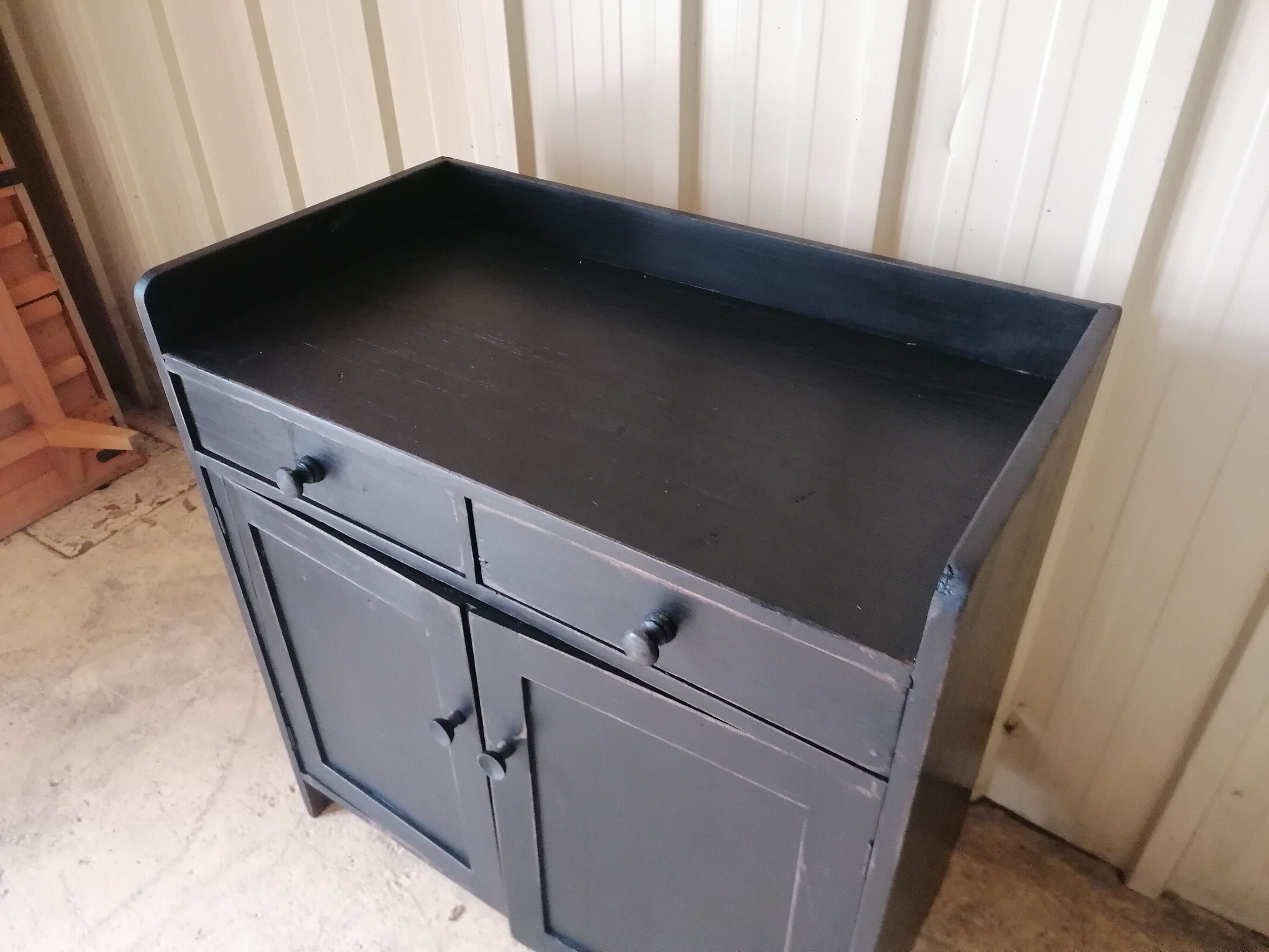 Low wooden entrance furniture