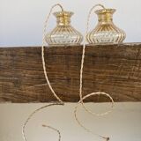 Pair of amber glass walkmen to hang in suspension