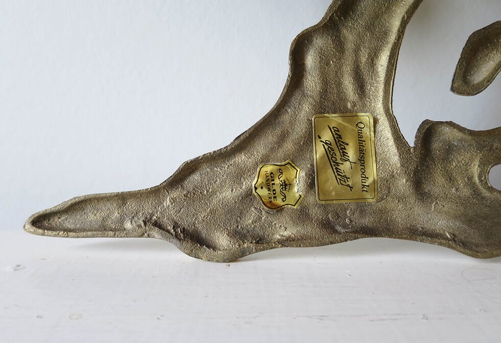 Brass wall sculpture