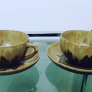 Duo of sandstone cups