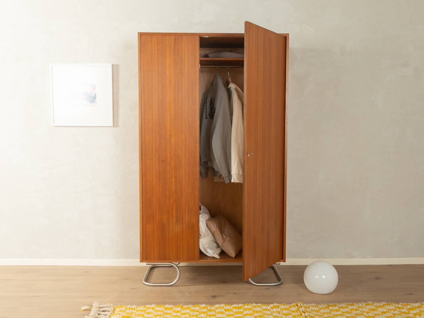 Purist wardrobe from the 1960s in teak veneer by DeWe