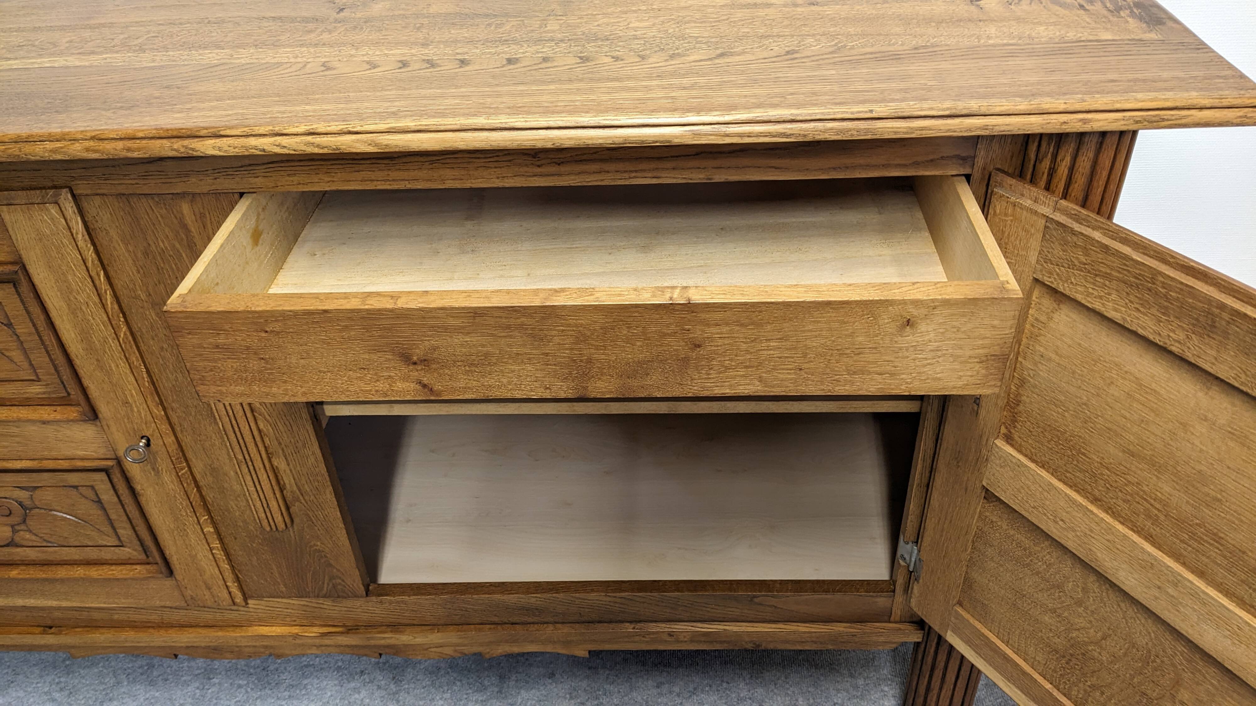 Brutalist oak sideboard attributed to Joseph Savina, France circa 1950.
