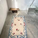 White and blue floral wool rug