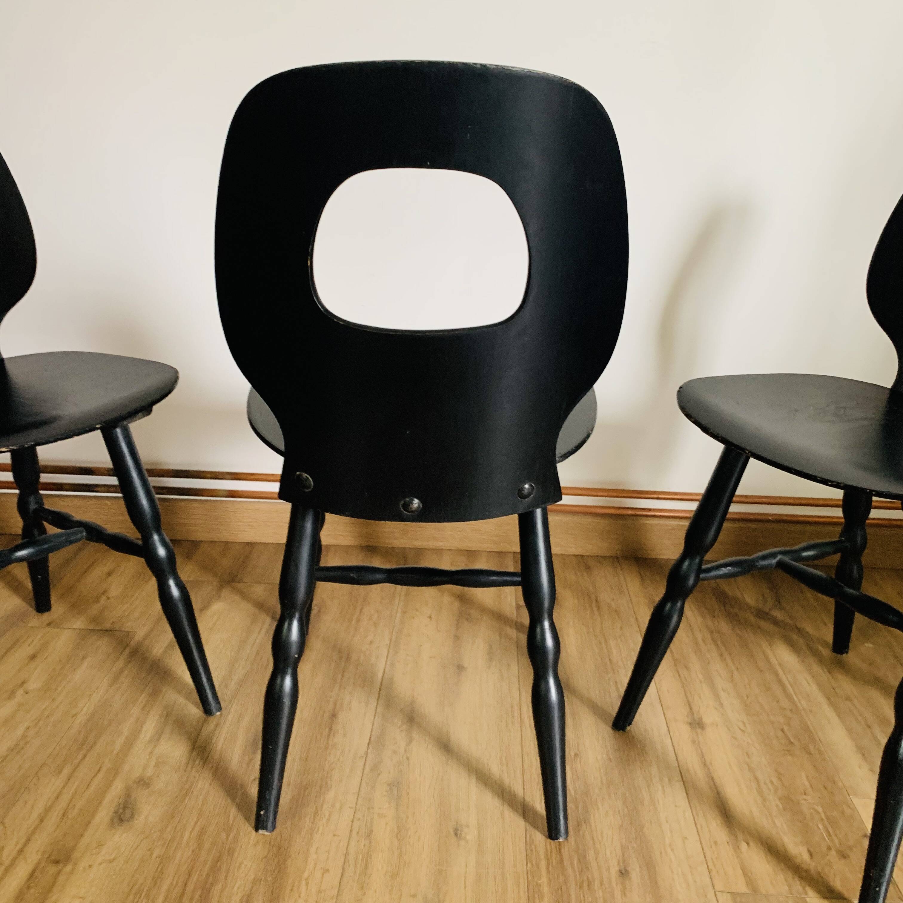 Set of 3 black Baumann eye model chairs