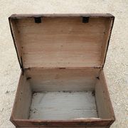 Old bombed travel trunk