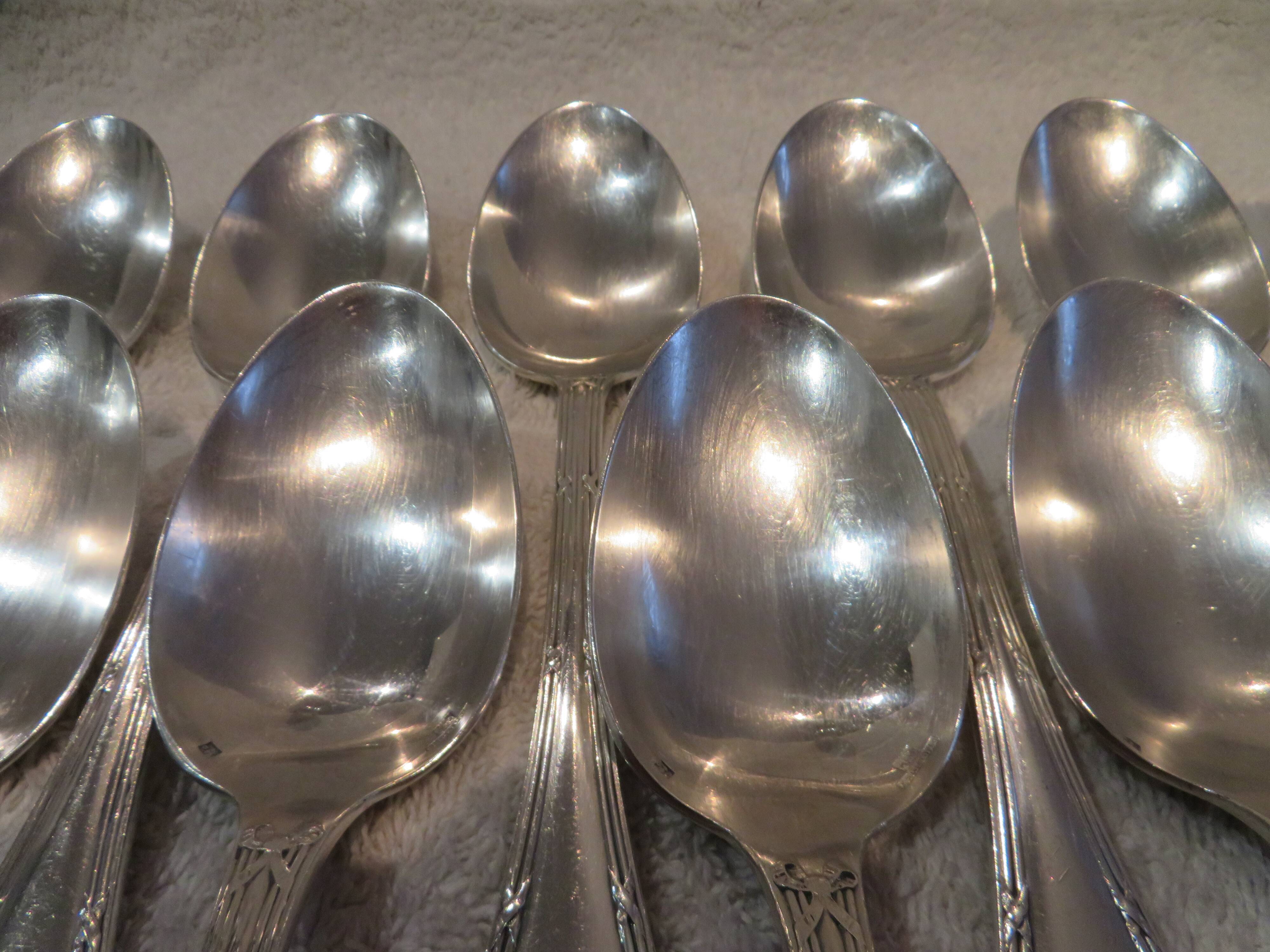 12 silver plated soup spoons by Christofle with Louis XVI ribbons