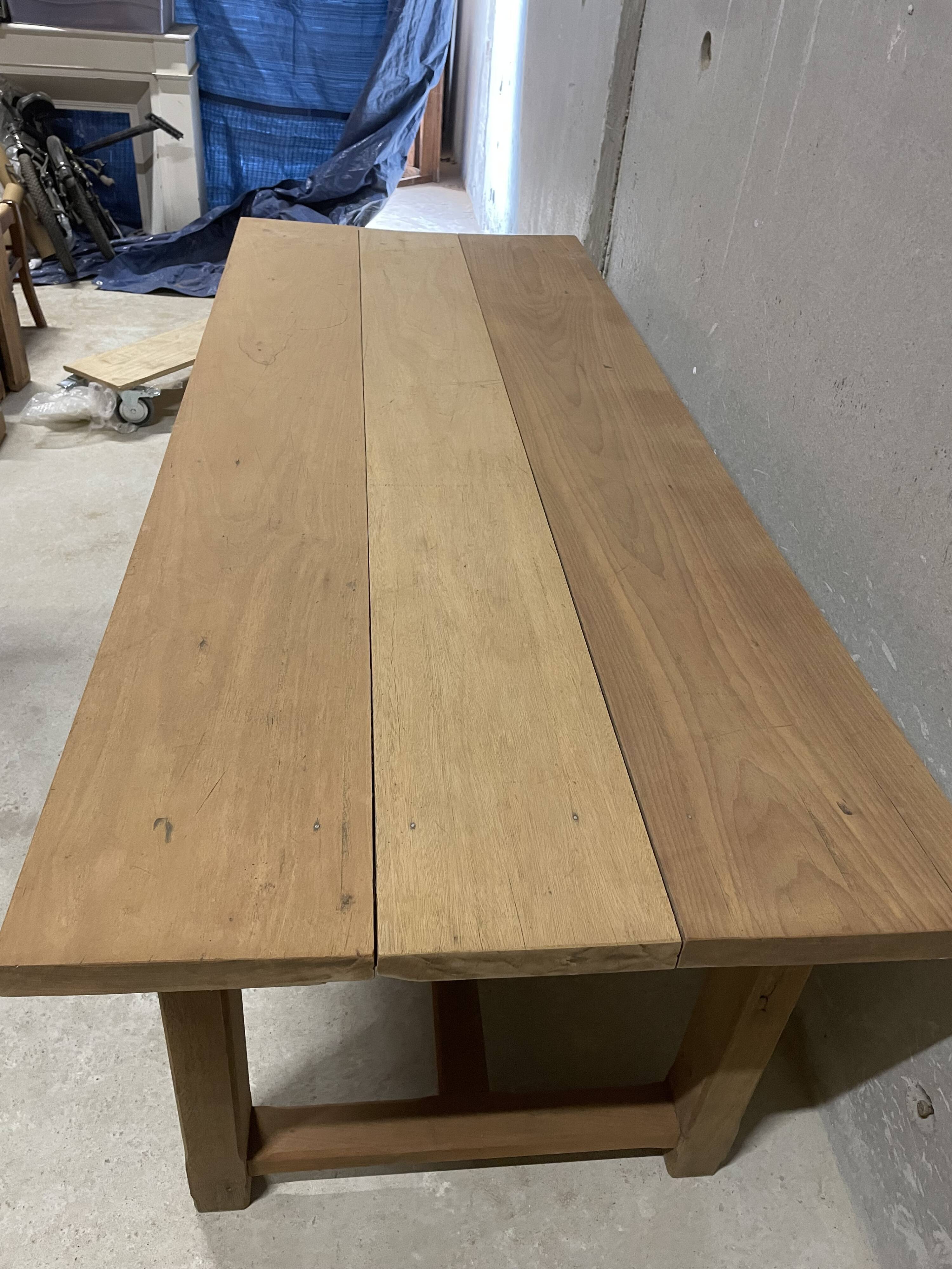 Large convivial solid wood table – ideal for big gatherings.