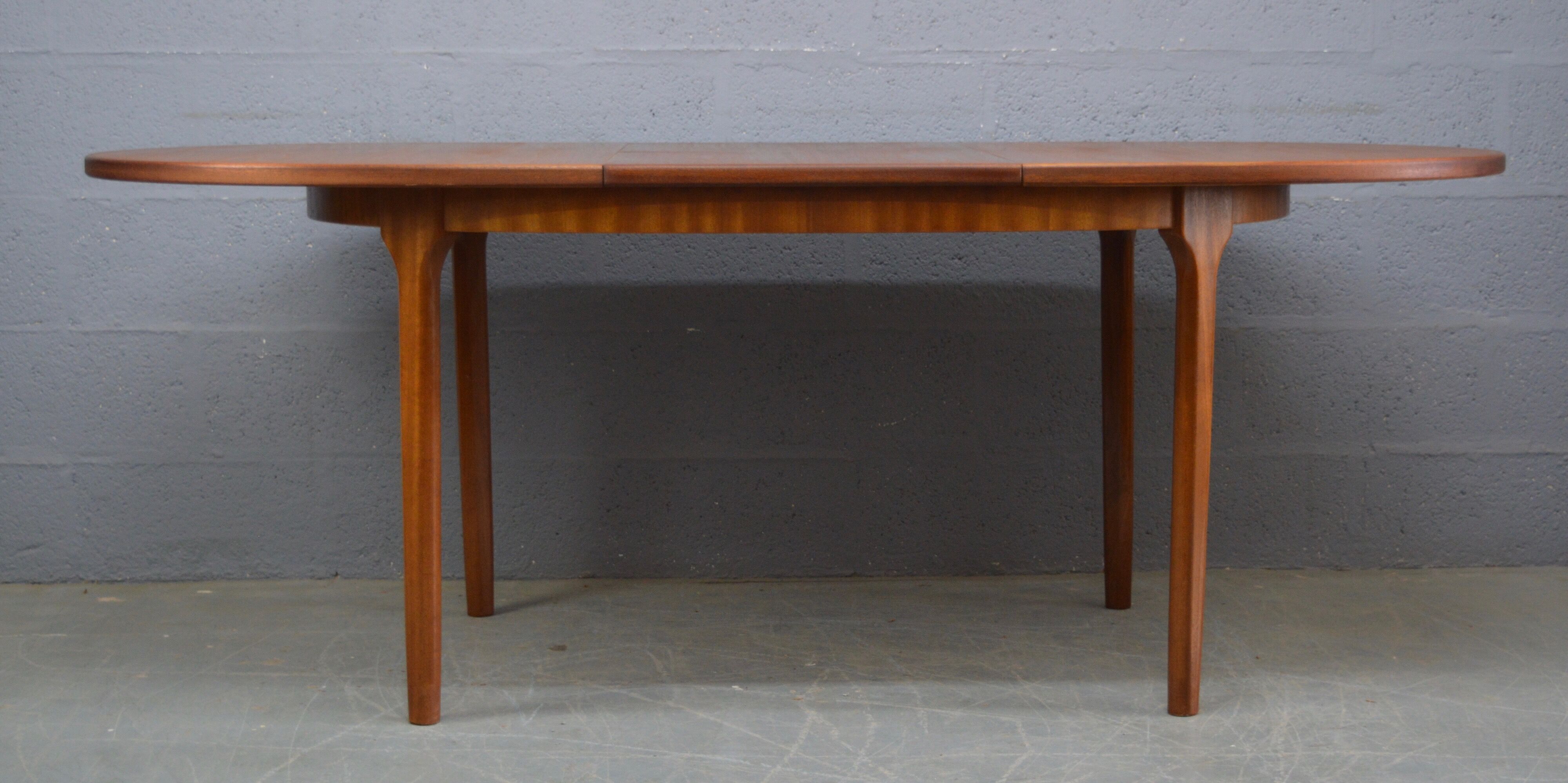 Mid Century Oval Sinning Table by McIntosh