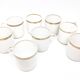 Lot of eight coffee cups and under cups