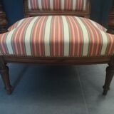 Pair of Louis XVI style walnut armchairs