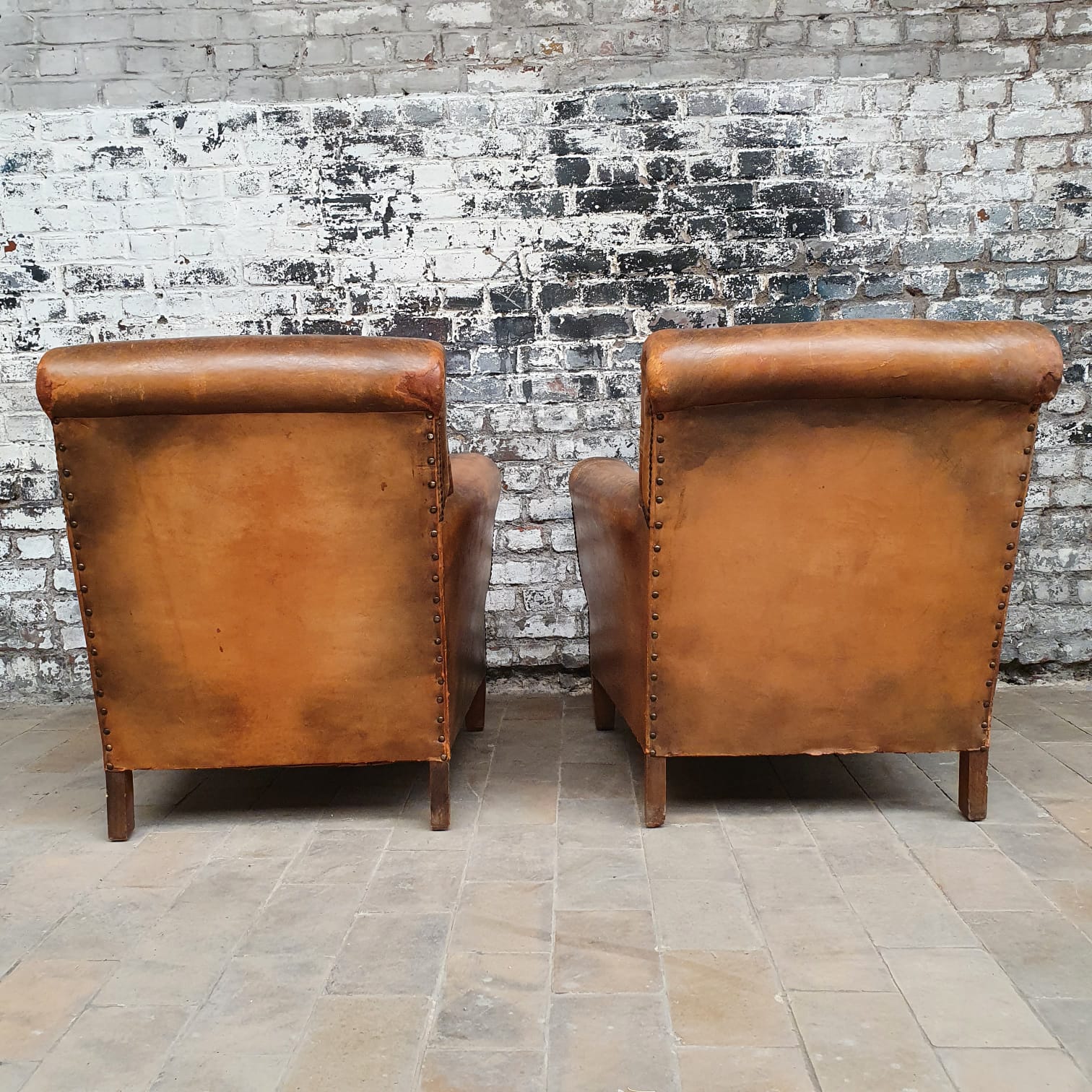 Pair of leather club chairs