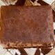 Vintage wooden and goatskin pouf