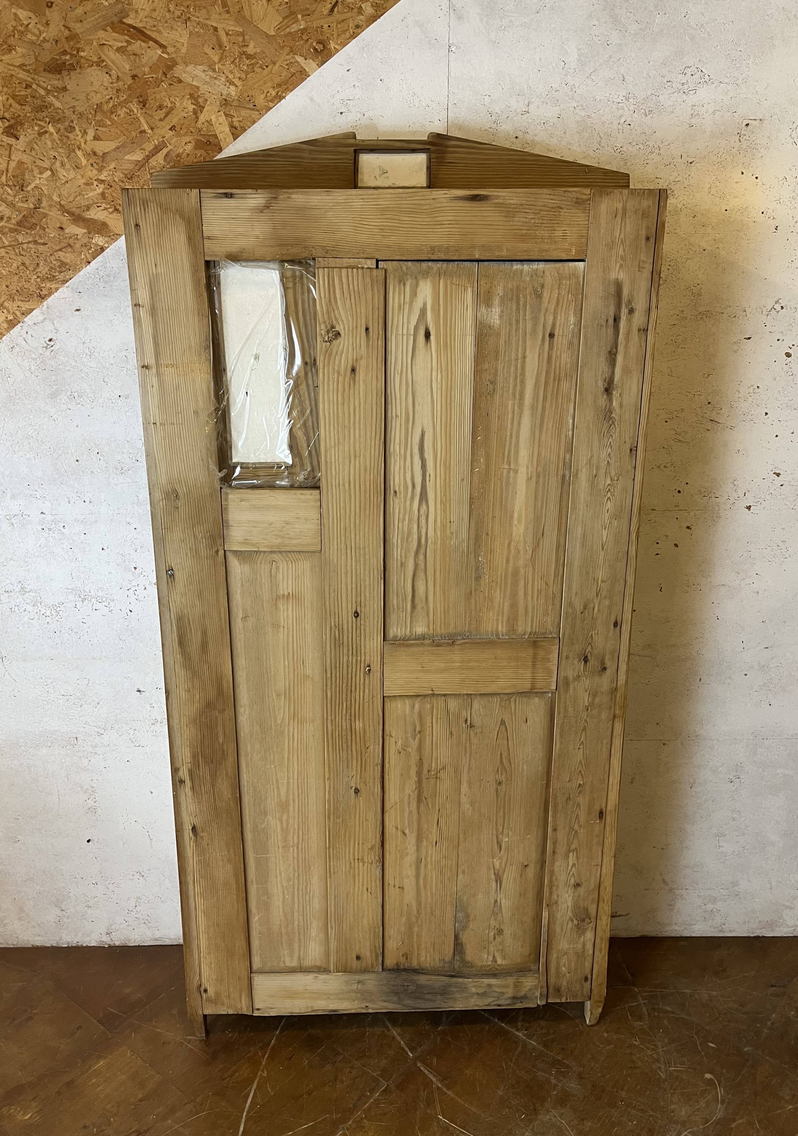 Art Nouveau wardrobe in pine with ceramic tiles, early 20th century.