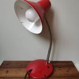 Articulated vintage red metal factory desk lamp