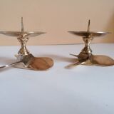 Two brass aviation propeller candle holders