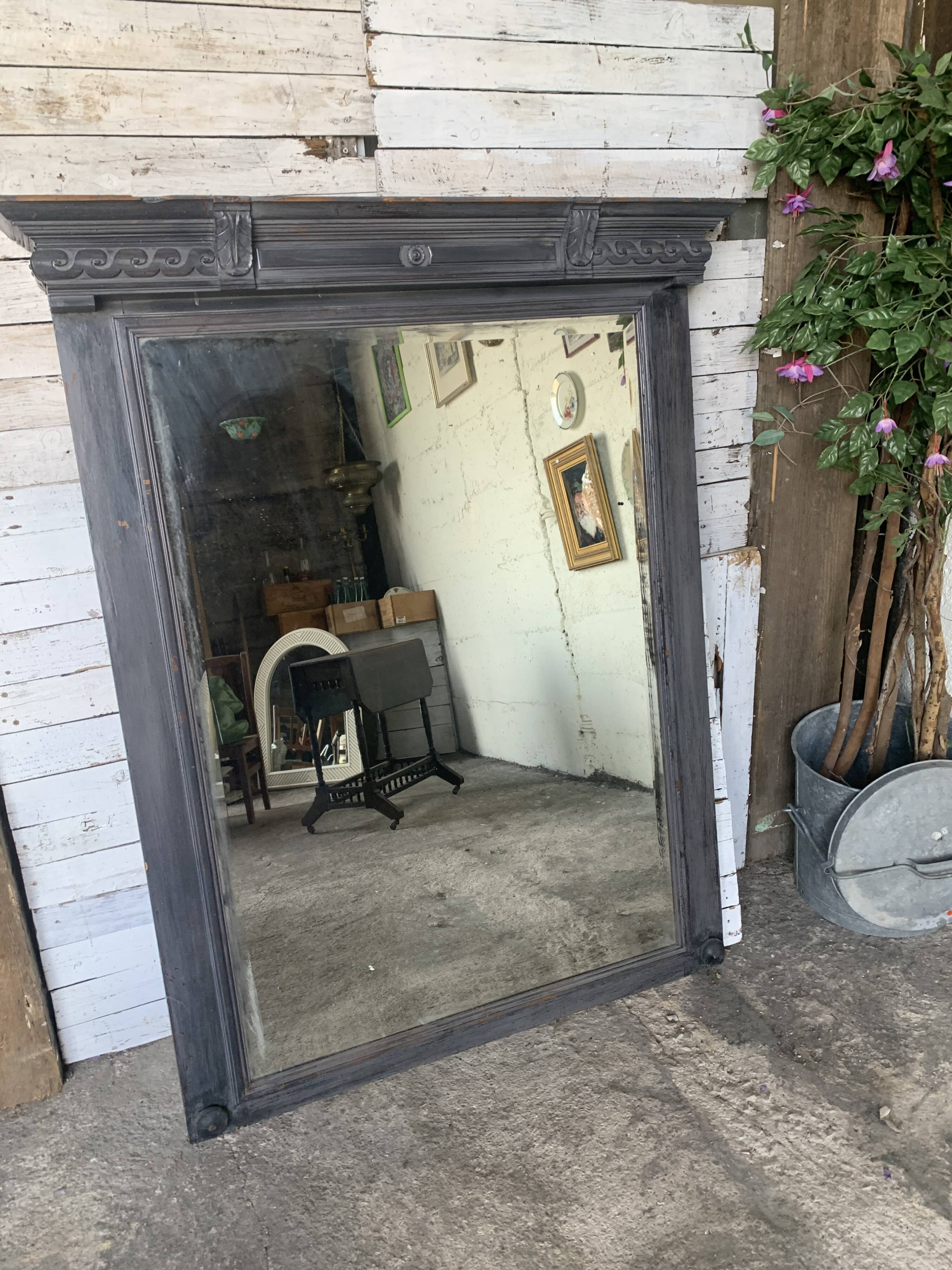 Wooden mirror with juice patina