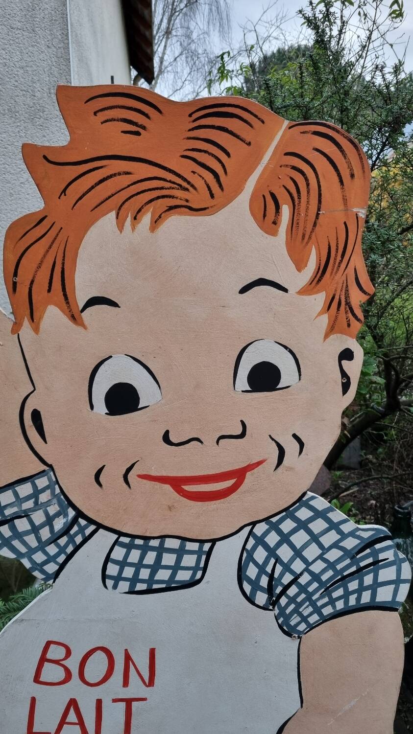 Very large old advertising panel or sign