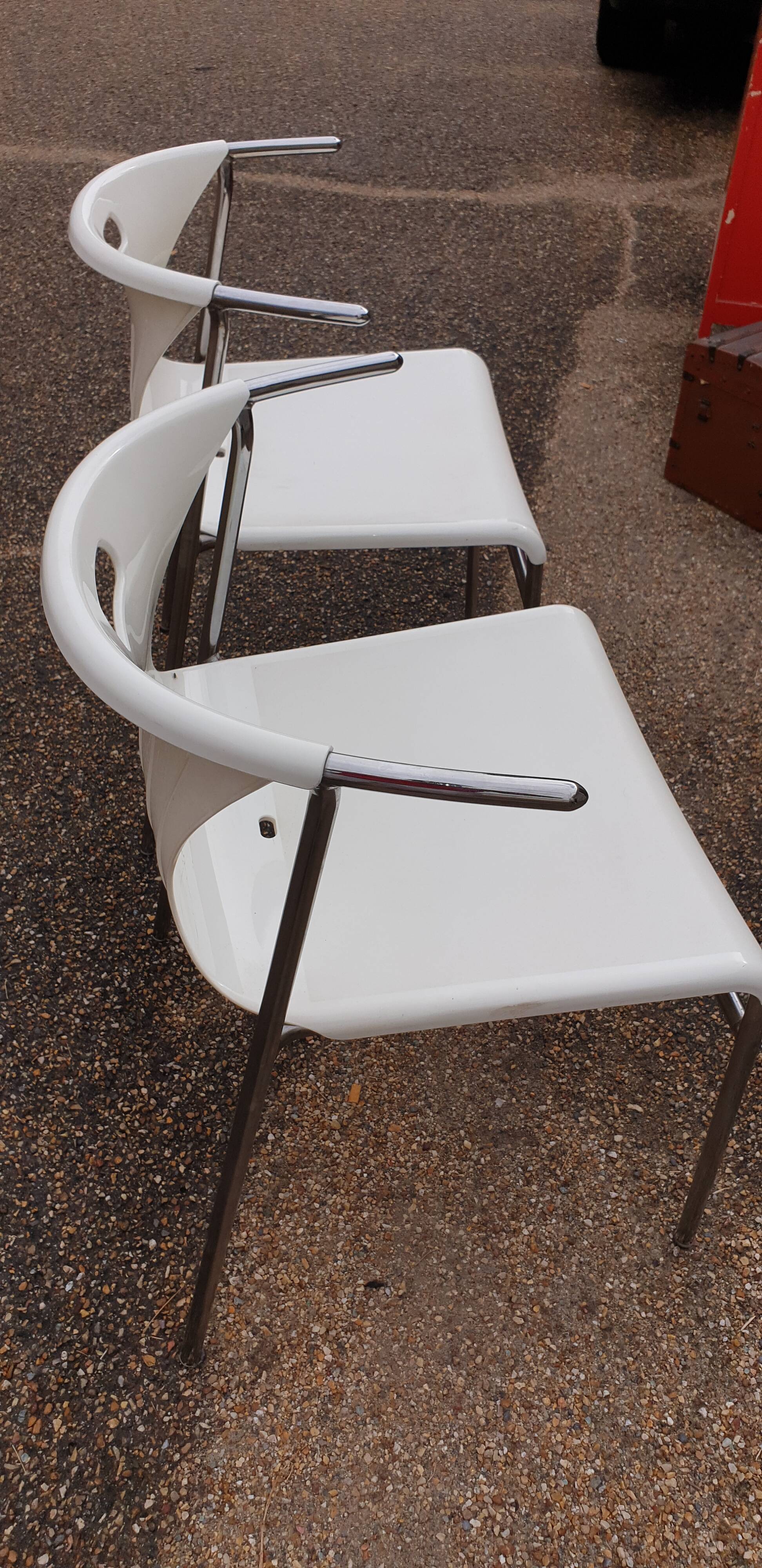 Pair of chrome and resin design armchairs