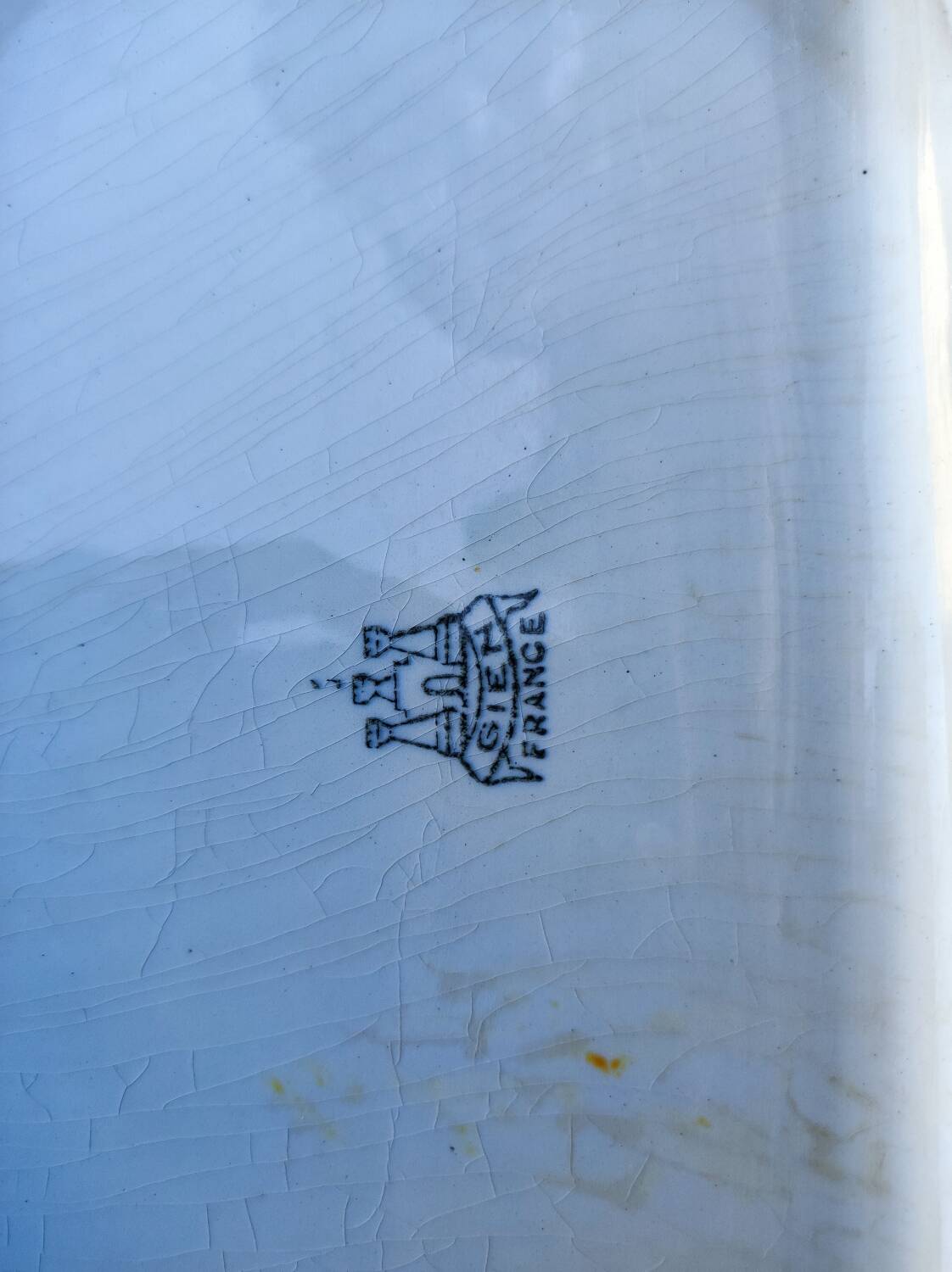 2 old earthenware dishes, one from Gien