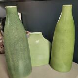 Trio of green enamelled vases