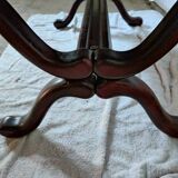 Living room coffee table with green leather and wood top