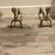 Neoclassical pine cone fireplace chenets in bronze