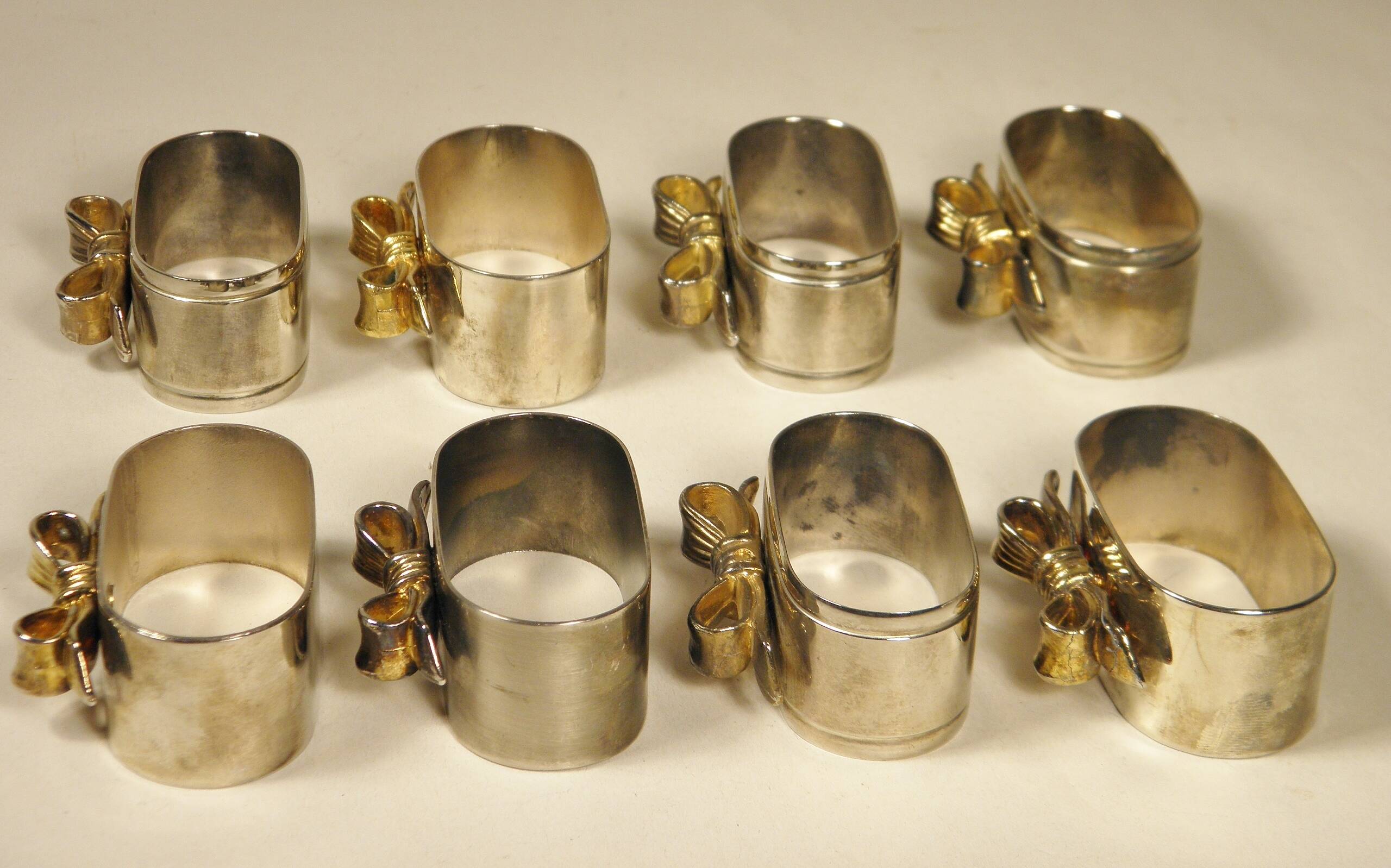 8 silver and gold napkin rings