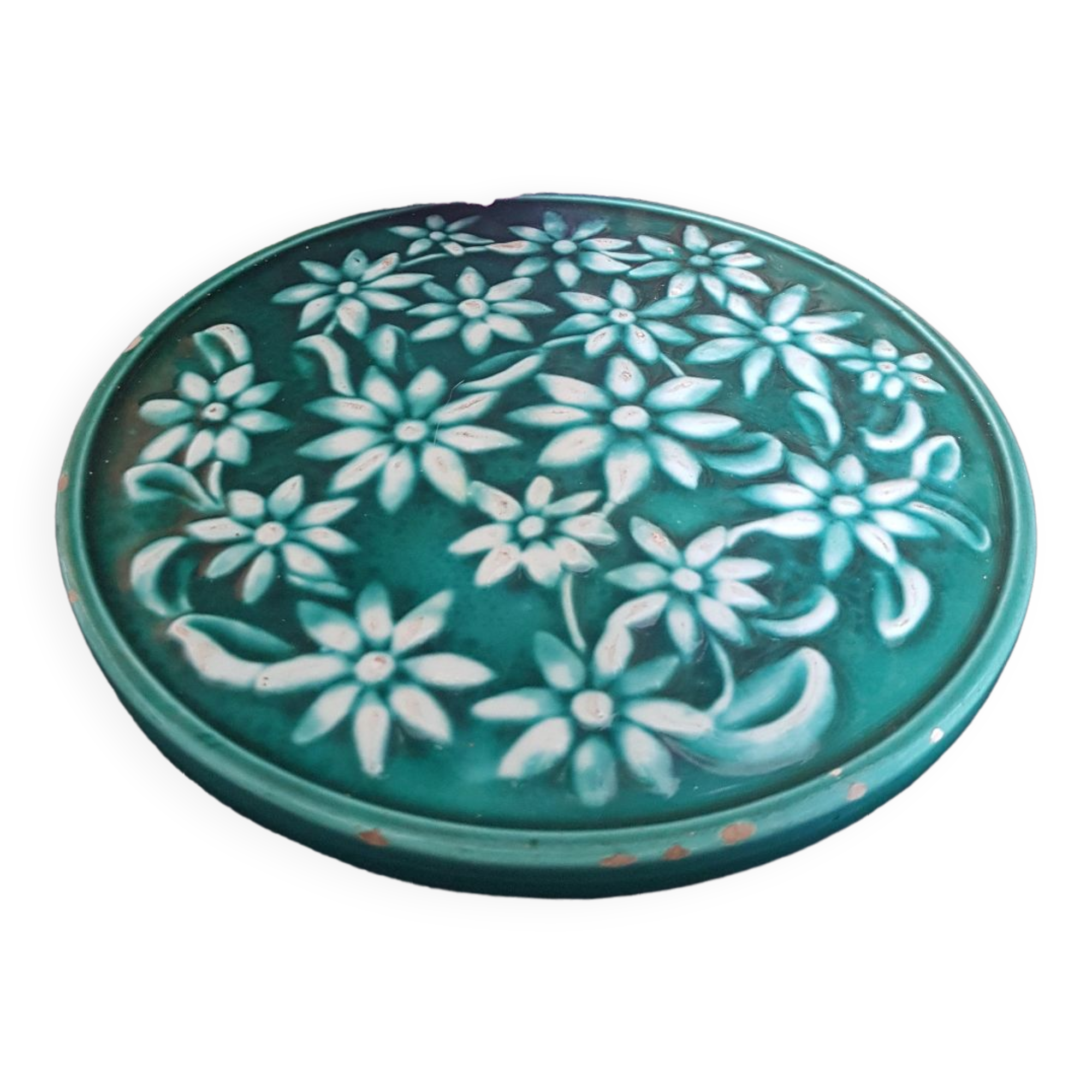 Dessous de plat vert à fleurs