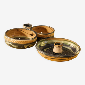 Lot de 2 bougeoirs en poterie vernissée signés