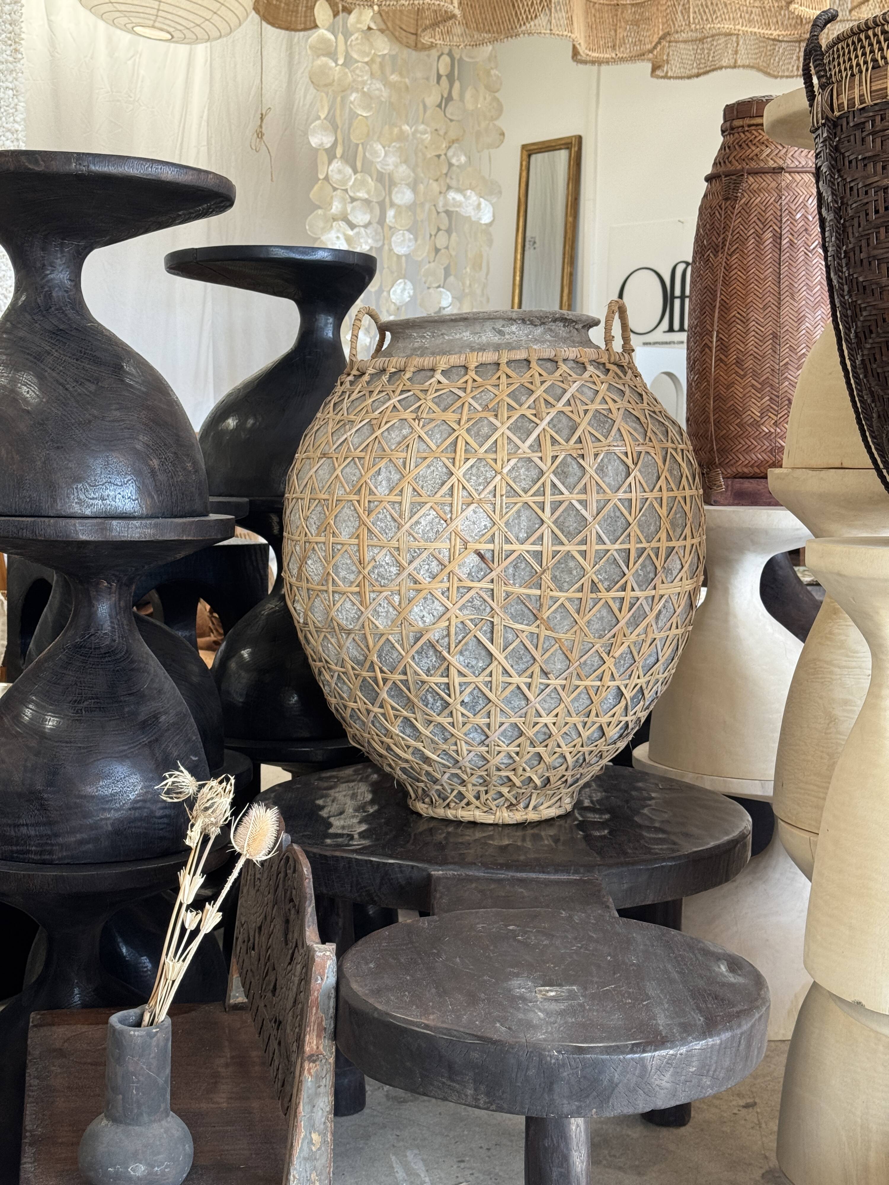 Immense light grey antique-style pot with a crosshatch lid and handles.