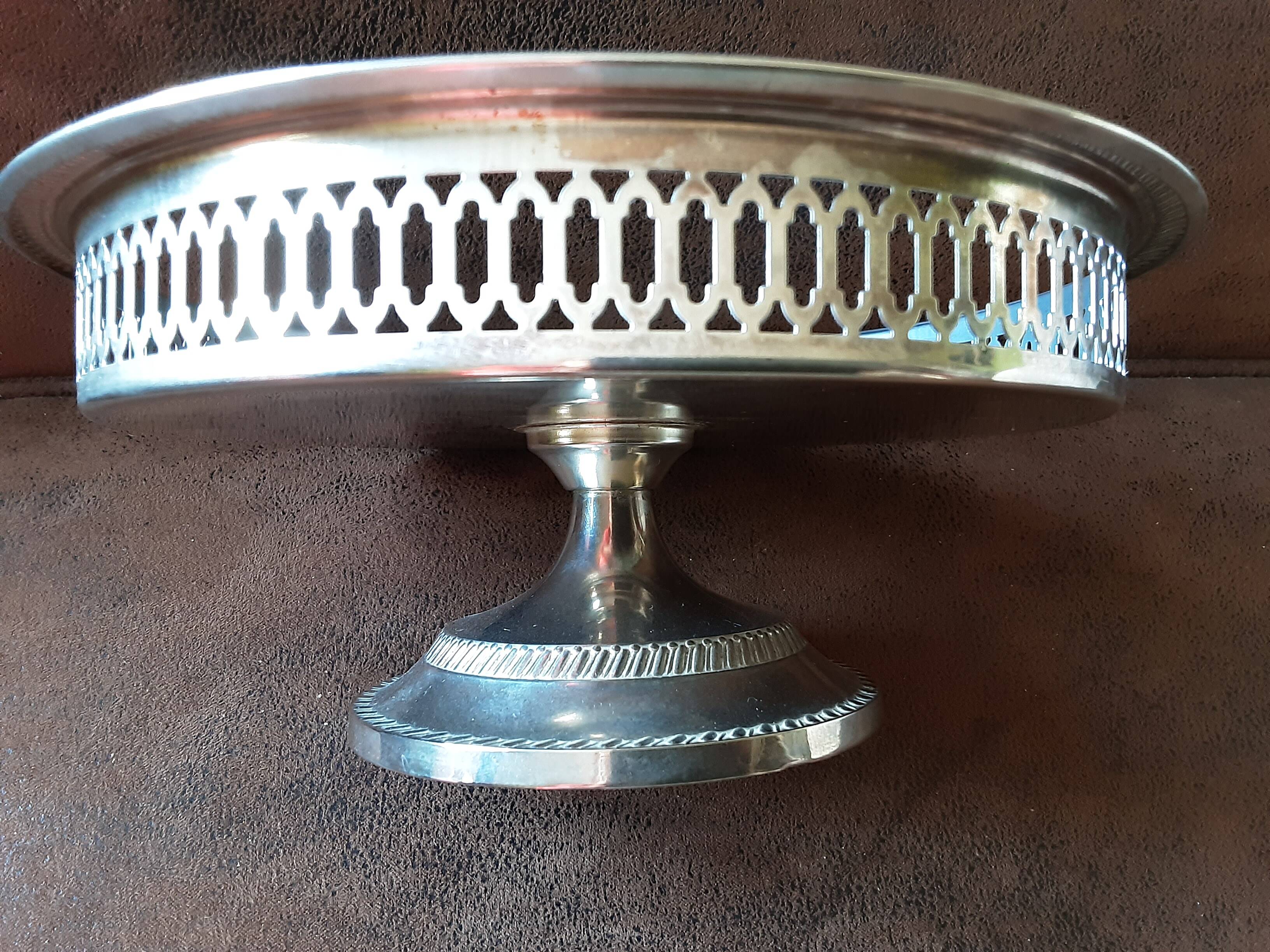 Old metal bowl on foot