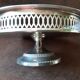 Old metal bowl on foot