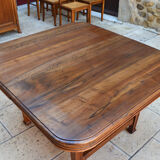 Extendable Art Nouveau table in carved walnut, circa 1900