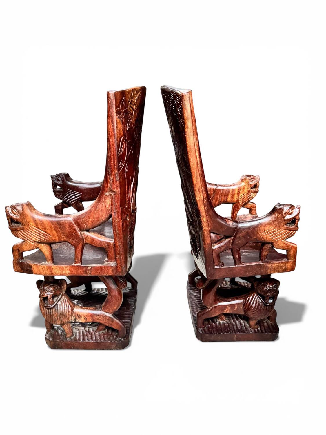 Pair of carved African armchairs