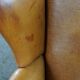 Wingback chair made of sheepskin leather in a light honey color