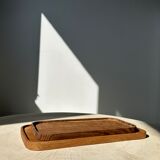 Trio of rounded rectangular trays or cups in monoxyl teak L:35