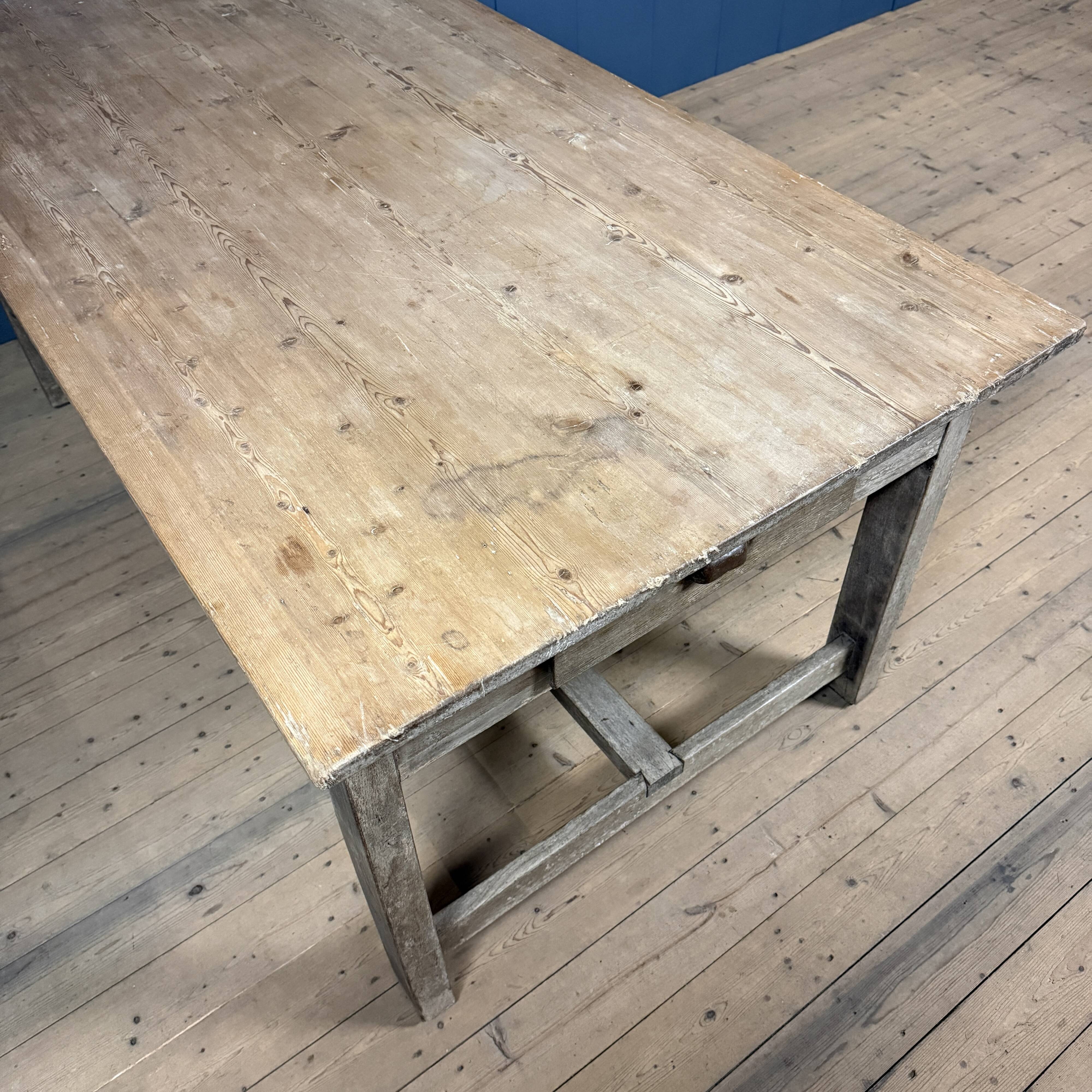French farmhouse dining table with pine top and oak base