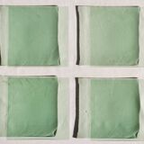 Set of 4 small square green glass plates/bowls